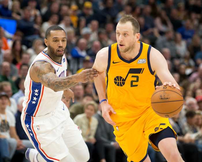 Joe Ingles (2) drives into the paint against the Philadelphia 76ers